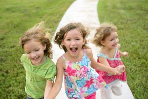 Going from two to three children: The good, the bad and the ugly