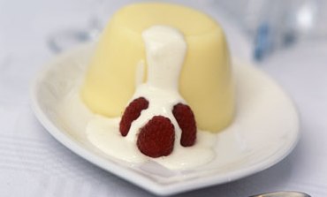 Cream pudding with fresh autumn bliss raspberries