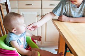 When should you start to wean your baby onto solid foods?