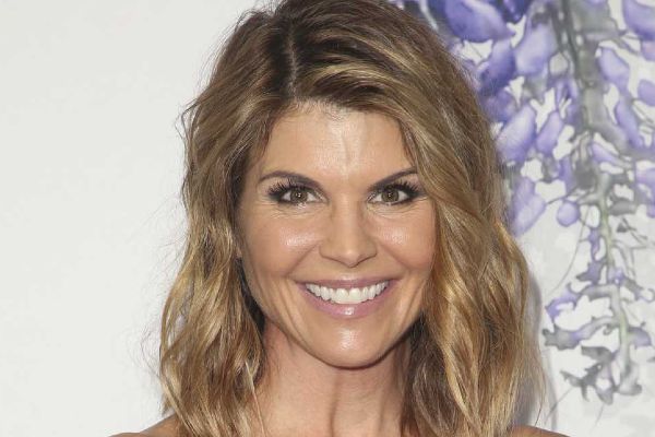 Full House's Lori Loughlin turns herself into FBI amid college...