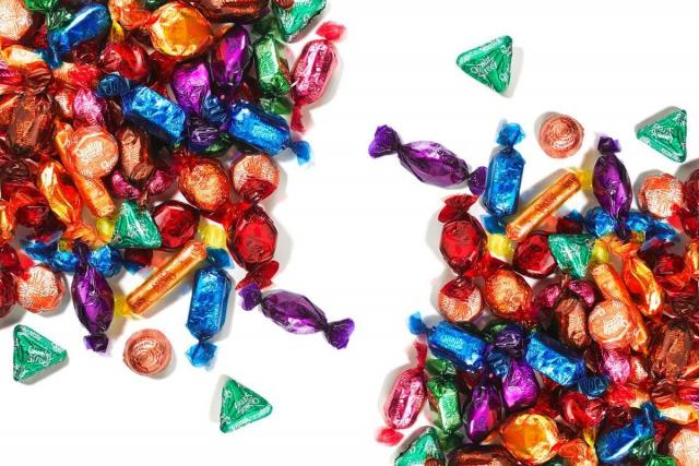 Show you care with a tin of personalised Quality Street