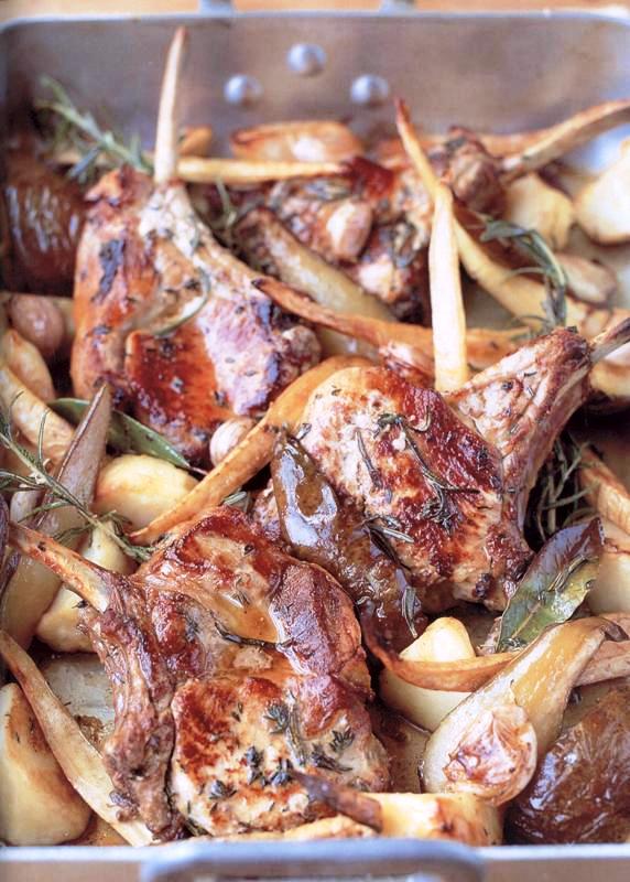 Tray-baked pork chops with herby potatoes, parsnips, pears and minted bread sauce