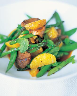 Stir fried duck with sugar snap peas and asparagus