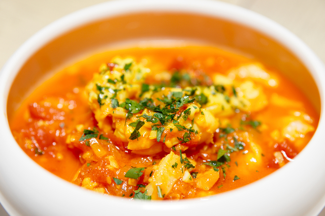 Mediterranean fish stew with garlic toasts