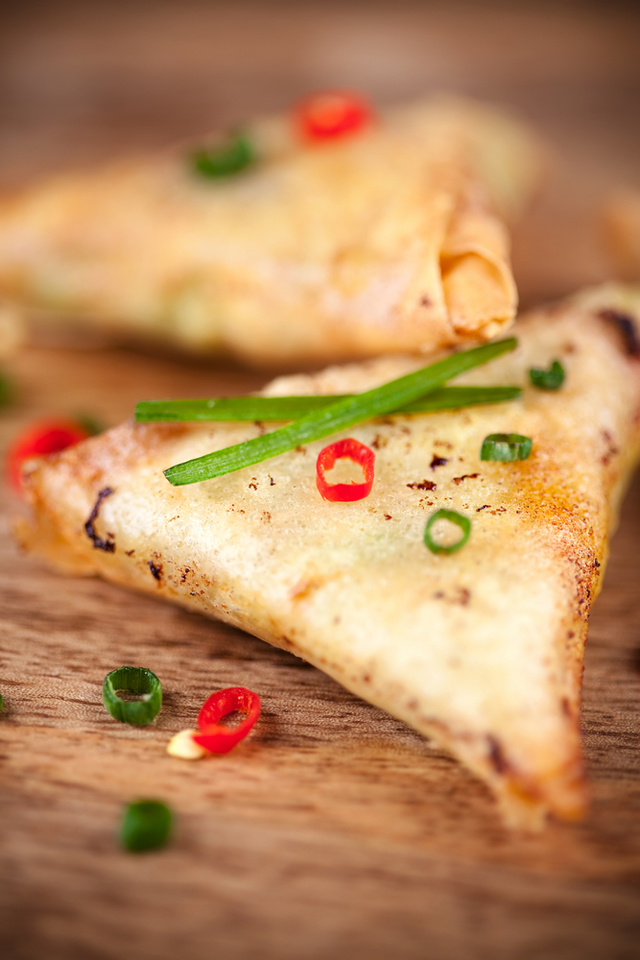 Spinach samosas with chilli and lime salad