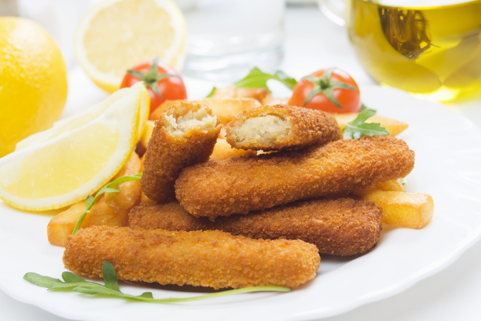 Salmon fish fingers with tomato and basil dip