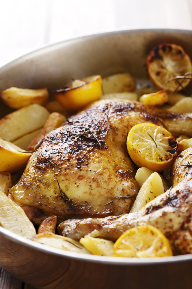 Lemon and herb roast chicken with new potatoes