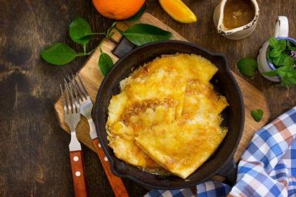 Craving some grown-up pancakes? This Crêpes Suzette recipe is absolutely scrumptious