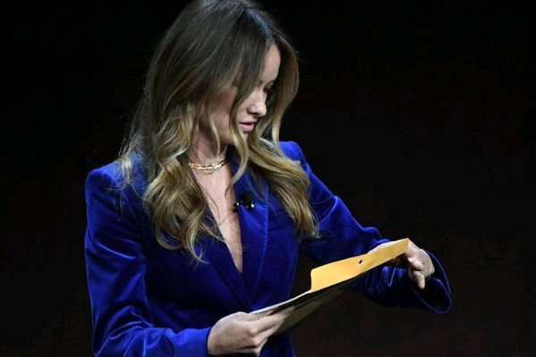 Director Olivia Wilde was served custody papers while presenting on stage