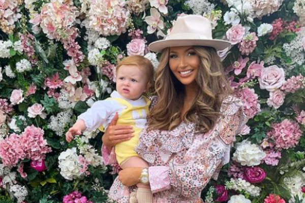 TV star Charlotte Dawson shares sweet moment with son Noah by her late dad’s memorial