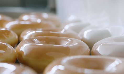 Doughnut fans invited to celebrate Krispy Kreme 85th birthday with €8.50 dozens!