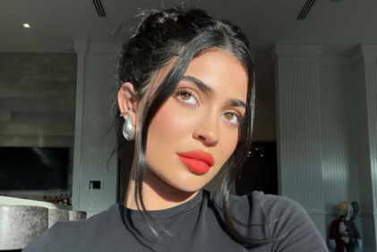 Fans react to Kylie Jenner sharing rare photos of new baby son and teases name