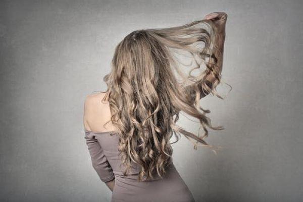 Sleek and shiny: The best anti-frizz treatments to tame flyaways this summer