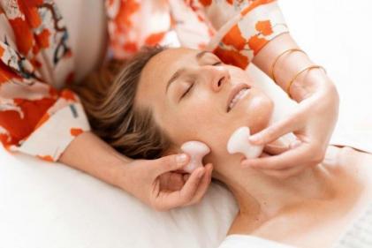 Expert practitioner advises on how face yoga improves the appearance of skin 