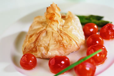 Salmon filo pastry parcels with cherry tomato compote