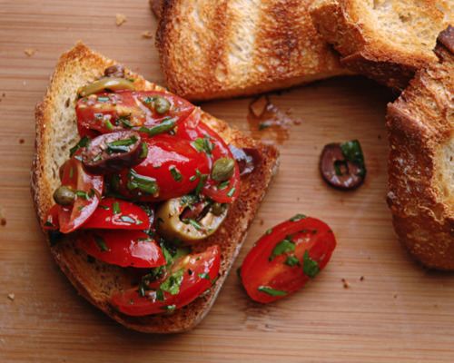 Herbed bruschetta with olives and capers