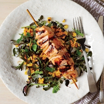 Gingered salmon with grilled corn and watercross salad