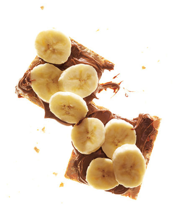 Crackers with chocolate spread and banana