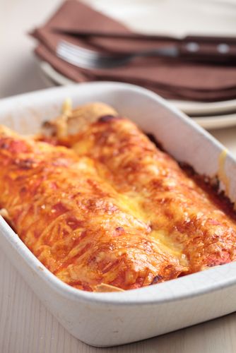 Chicken enchiladas with a creamy pumpkin sauce