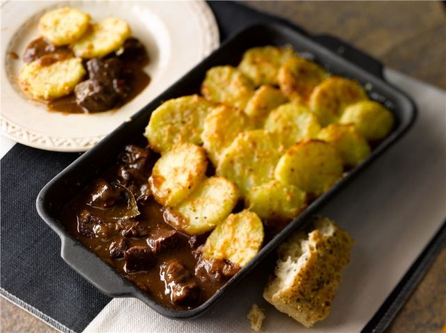 Beef casserole with sliced potato topping