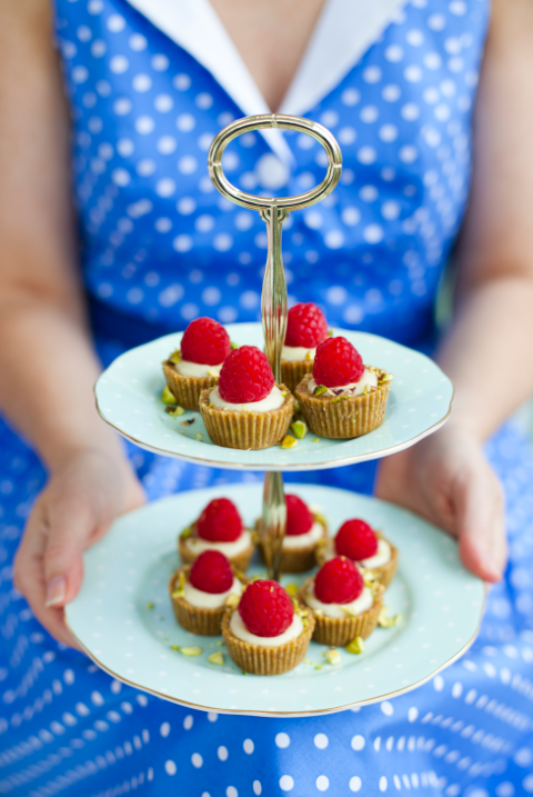 Teeny white chocolate, pistachio and raspberry tarts