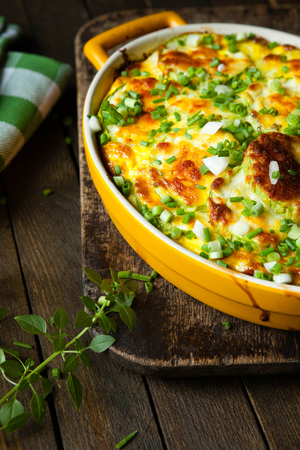 Rustic rosti casserole with baked eggs