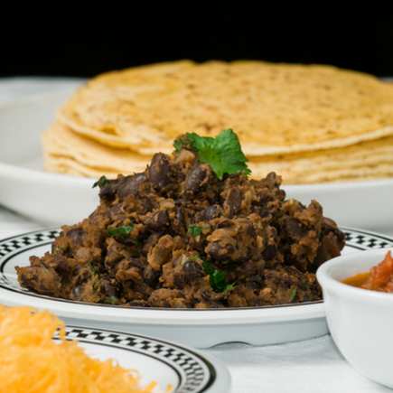 Black bean dip with fresh salsa and tortilla chips