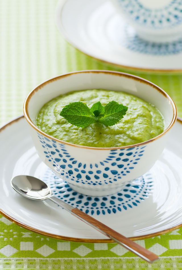 Pea soup infused with mint served with parmesan biscuits 