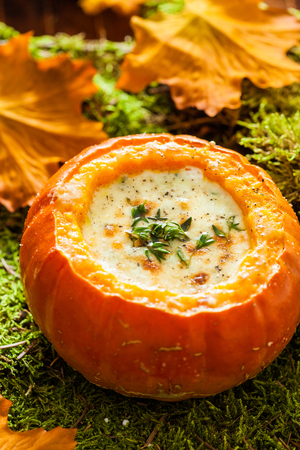 Creamy roasted pumpkin soup with thyme and parmesan
