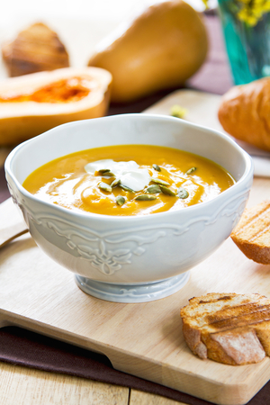 Roasted butternut squash soup with toasted pumpkin seeds