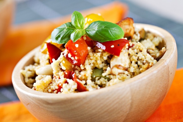 Roast tomatoes with couscous and harissa