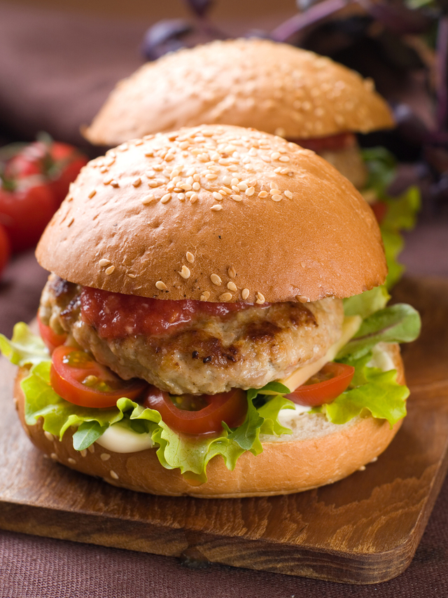 Pork burgers and herb flavoured chips