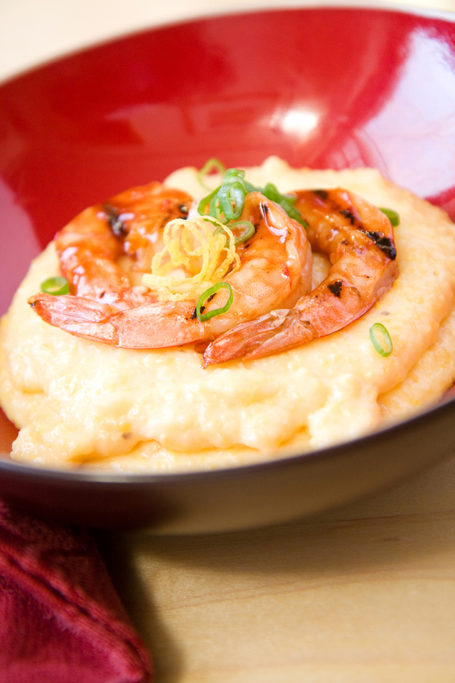 Prawns with spinach over roasted garlic polenta