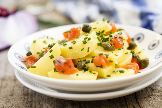 Smoked salmon and potato salad with greens