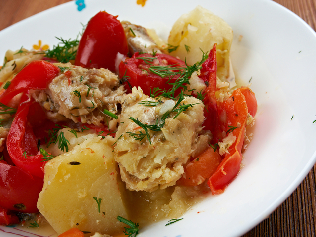 Stewed white fish with potatoes and peppers