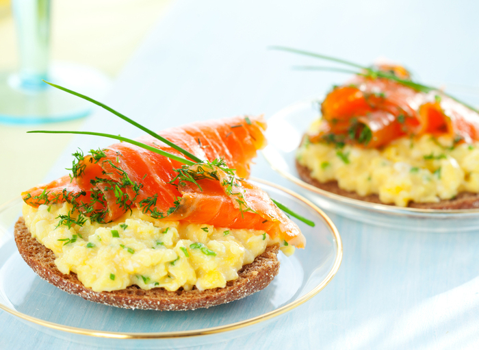 Scrambled eggs and smoked salmon on soda toast