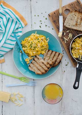 Scrambled eggs with onion and cheddar cheese