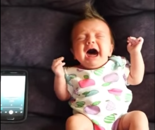 Crying tot's reaction to country song is delighting YouTube...