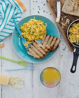 Scrambled eggs with onion and cheddar cheese