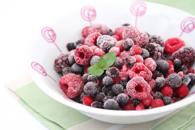 Iced berries with a hot white chocolate sauce