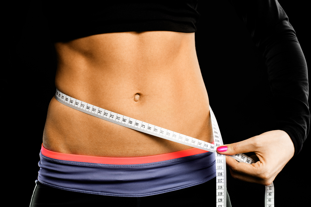 Want a flat stomach? Check out our top five ways to achieve it!