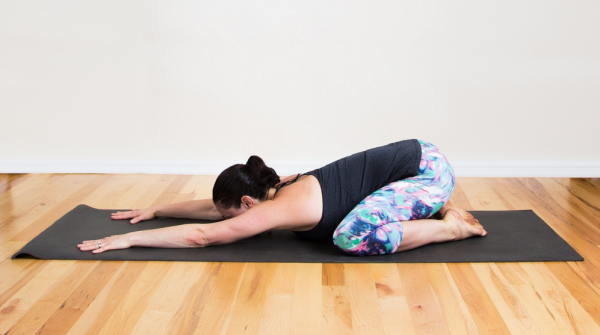 ease back pain with these easy yoga poses